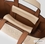 BOLSO TOTE PEQUEÑO PERFORADO K/CIRCLE T.BEIGE