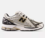 Zapatillas New Balance 1906R metallic silver/gold